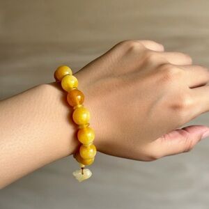 Burma Golden Imperial Jadeite Stretch Bracelet, 10mm Beads,
Length is 6”